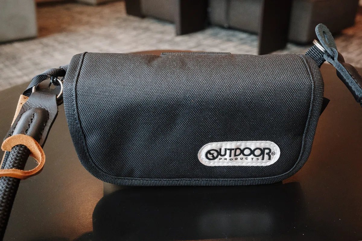K and F Concept neck strap secured to both sides of the OUTDOOR PRODUCTS Camera Pouch 05