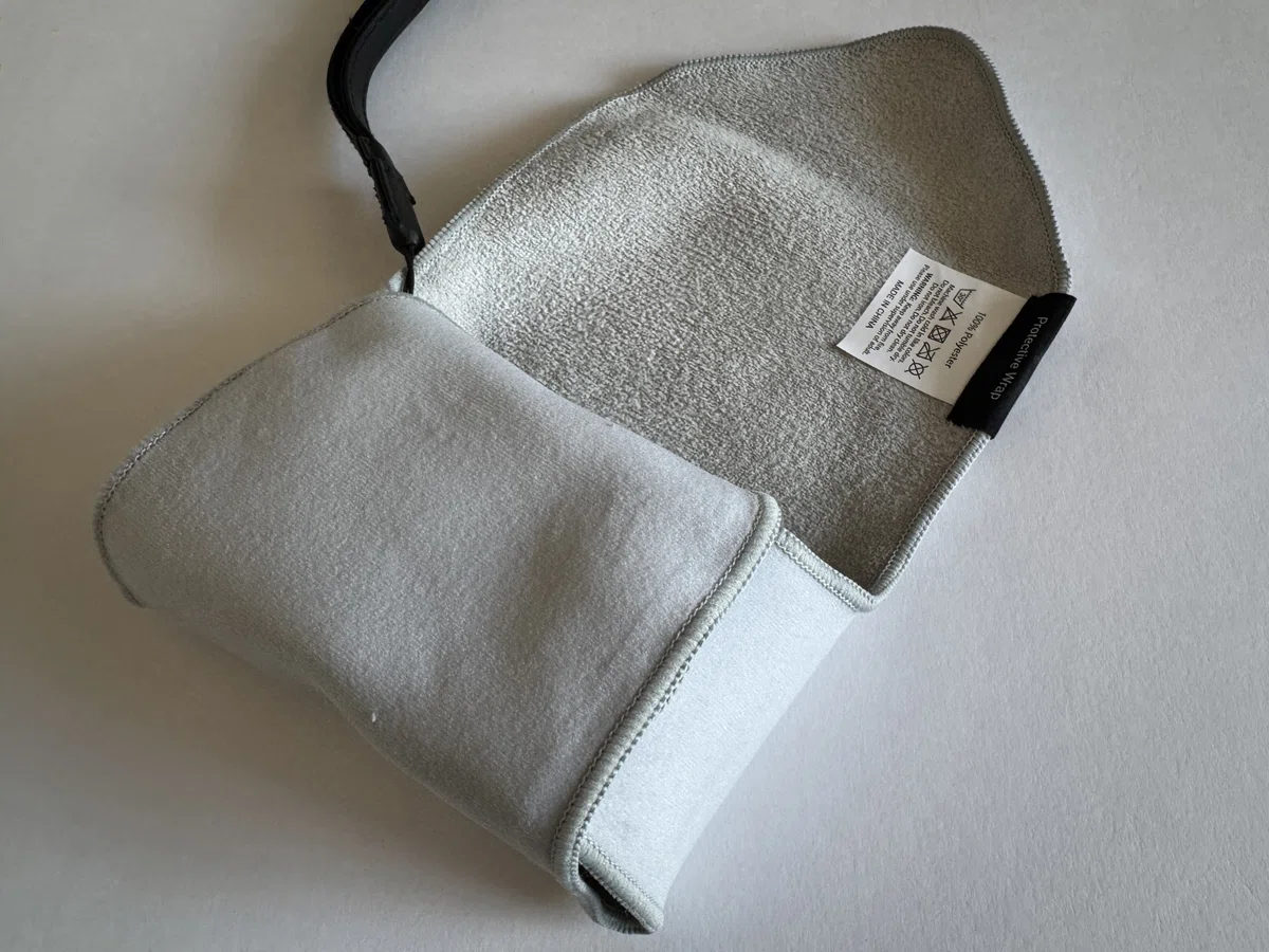 Wrapping a Ricoh GR IV with the soft inner surface of the JJC Protective Wrap
